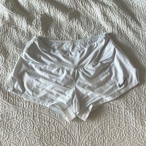White Nike shorts